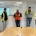 Élèves en CAP CRM en visite au sein du Groupe Coué TRM, réunis dans une salle de réunion en gilets haute visibilité